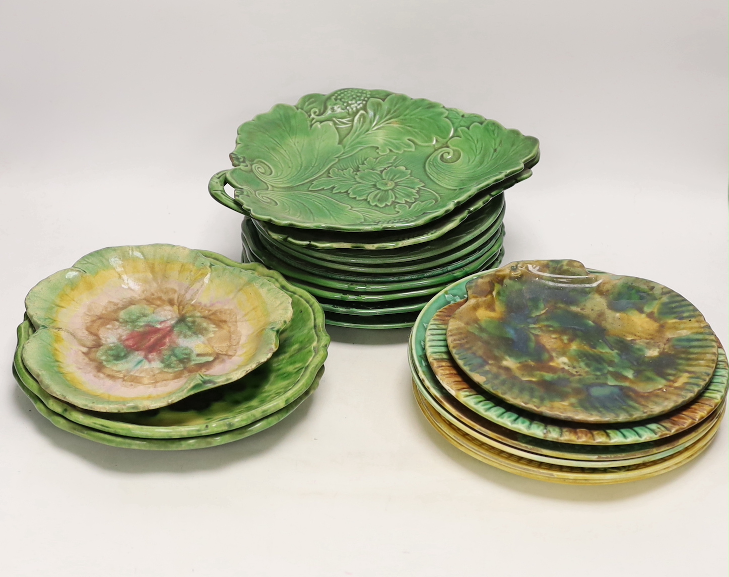 A group of 19th/20th century greenware and majolica plates and dishes (18)